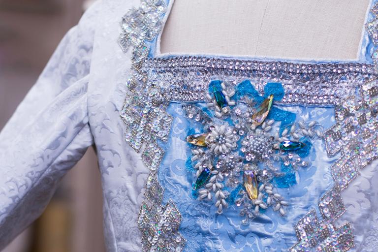 The Snow King costume's sleeves are separate from the ornate top