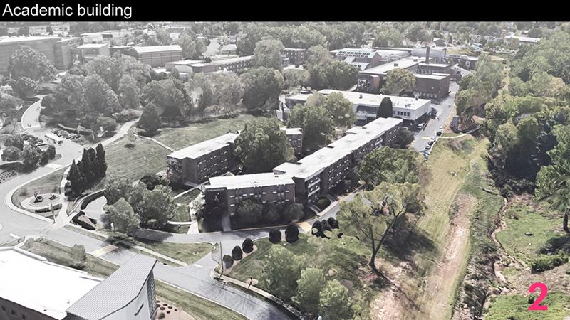 This view shows Lower Housing with the Welcome Center just visible in the lower left. The site slopes significantly and has a very prominent position within the campus. When Phase III of the Residence Hall project is complete all on-campus students will be housed in the new facilities. 