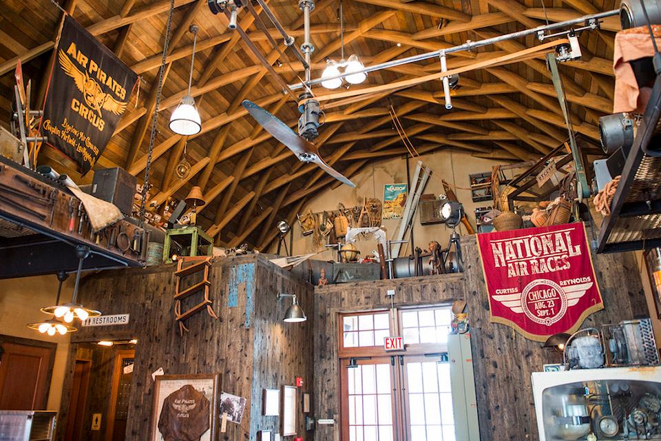 Jock Lindsey's Hangar Bar in Disney Springs is inspired by the Indiana Jones character from "Raiders of the Lost Art." Gearhart worked as a set decorator on the project, which is styled as a 1940s airplane hangar turned dive bar. / Photo: Disney 