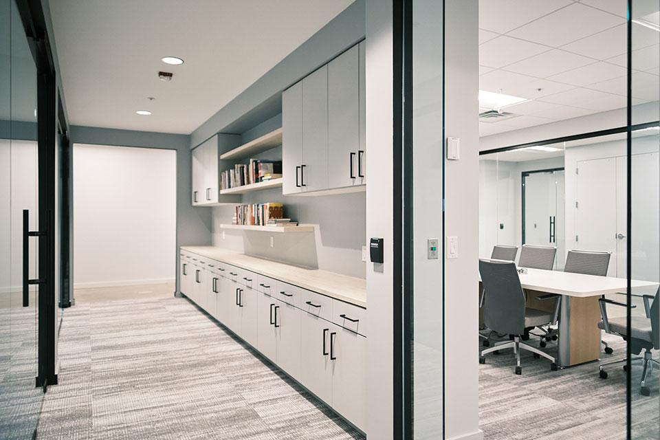 The Conference Room (to the right of the break room area) has space for meetings of up to 10, with adjacent individual meeting areas (to the left of the break room).