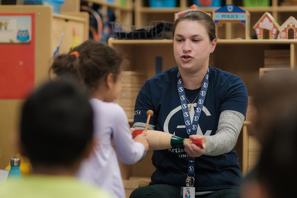 Ann-Louise Wolf and ArtistCorps members work with students at Easton Elementary School in Winston-Salem. / Photo: Raunak Kapoor