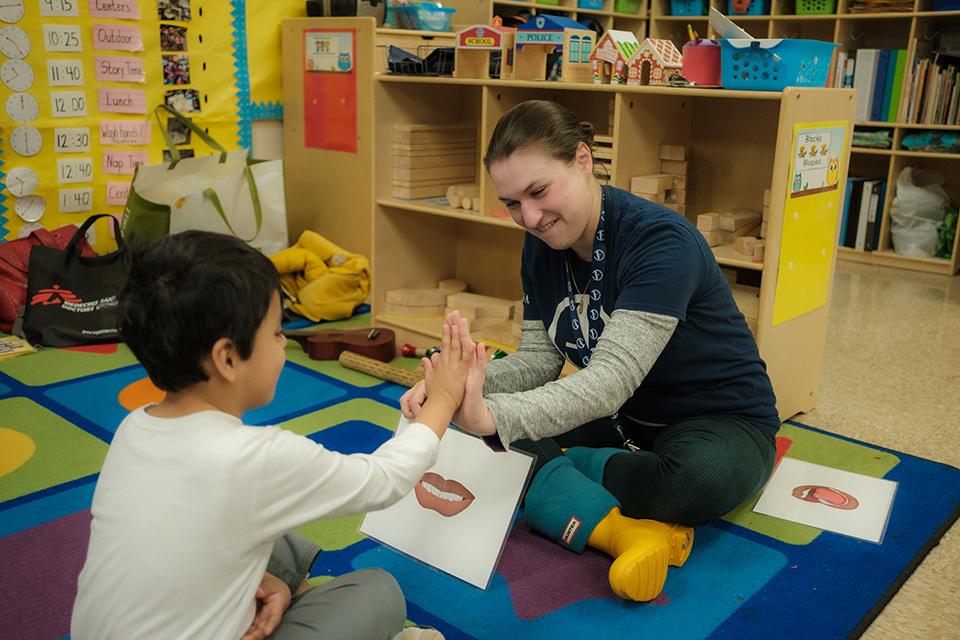 Ann-Louise Wolf and ArtistCorps members work with students at Easton Elementary School in Winston-Salem. / Photo: Raunak Kapoor