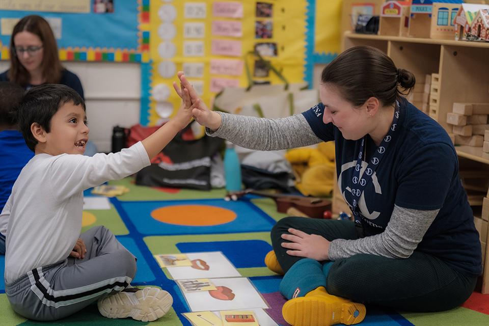 Ann-Louise Wolf and ArtistCorps members work with students at Easton Elementary School in Winston-Salem. / Photo: Raunak Kapoor