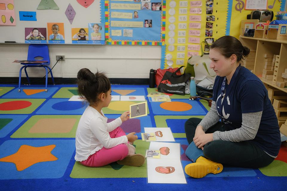 Ann-Louise Wolf and ArtistCorps members work with students at Easton Elementary School in Winston-Salem. / Photo: Raunak Kapoor