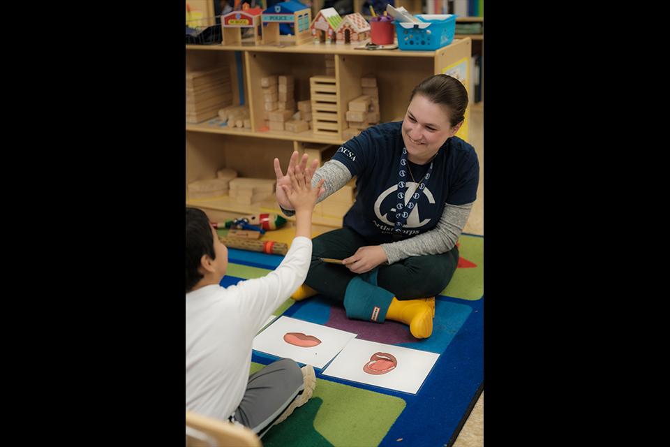 Ann-Louise Wolf and ArtistCorps members work with students at Easton Elementary School in Winston-Salem. / Photo: Raunak Kapoor