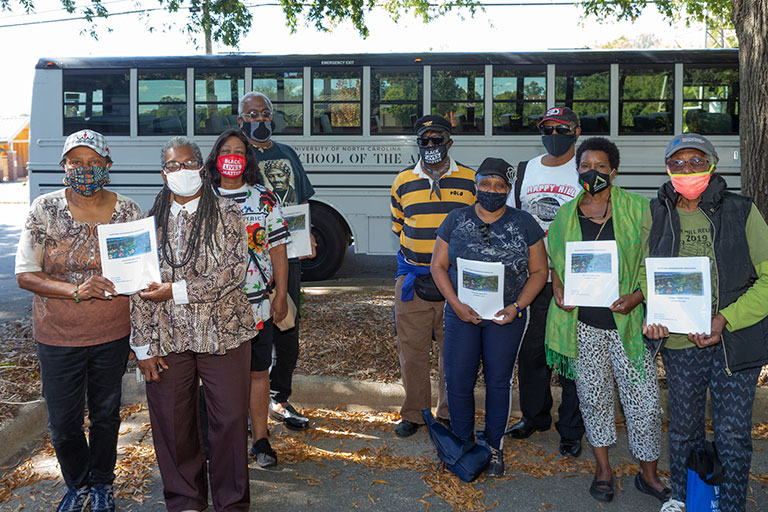 A bus tour of the Happy Hill neighborhood with community members and stakeholders in October identified locations on the Cultural Asset Map and informed the in-person community workshop. / Photos: Owens Daniels