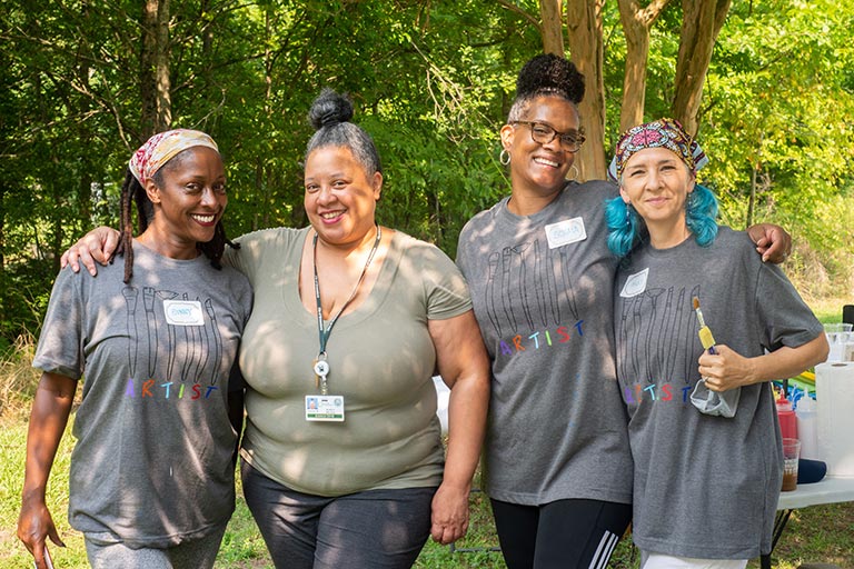 Artists with the Neighborhood Arts Residency Program host a community art event in the Kings Forest neighborhood.