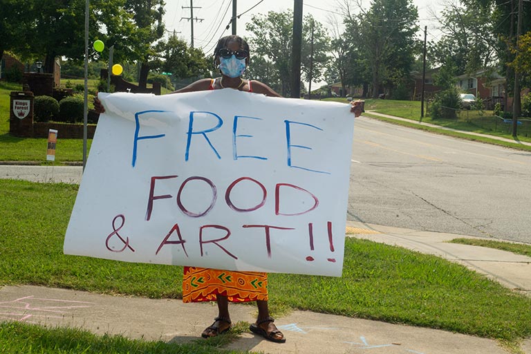 Artists with the Neighborhood Arts Residency Program host a community art event in the Kings Forest neighborhood.