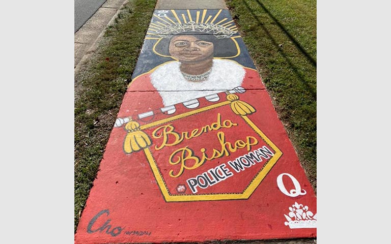 Murals painted on sidewalks, benches and picnic tables in the Kings Forest neighborhood in November 2021. / Photos: Ryan Deal