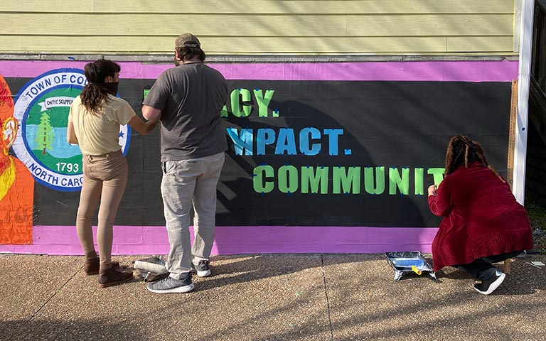 Workman's projects included four main programs: Mom’s Night Out, an ice cream social, a pig pickin’ and a Black History Month mural.