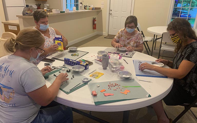 Workman's projects included four main programs: Mom’s Night Out, an ice cream social, a pig pickin’ and a Black History Month mural.