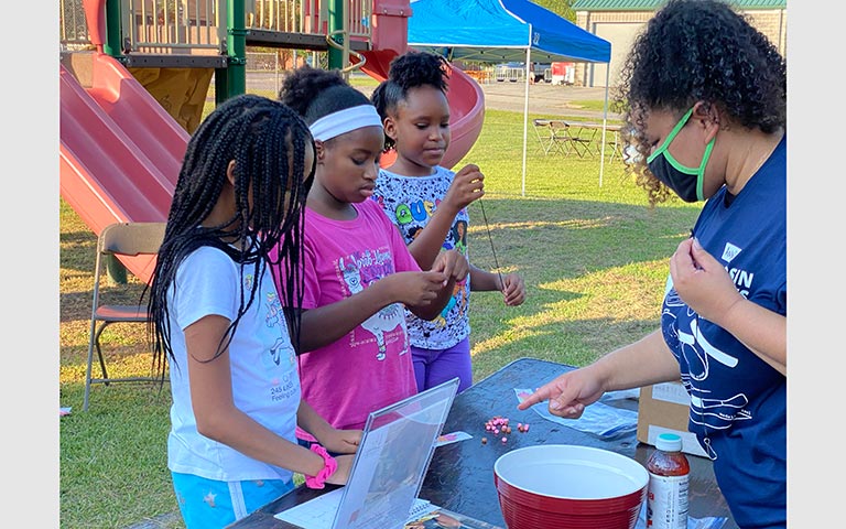 Workman's projects included four main programs: Mom’s Night Out, an ice cream social, a pig pickin’ and a Black History Month mural.