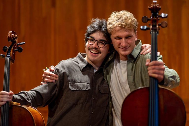 Jake Anderson (right) and his cello studio classmate Sam Mihavetz (left).