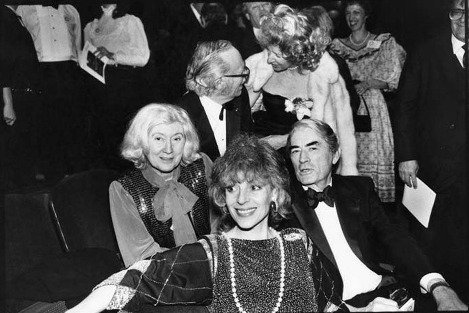 (Left to right, background) Kathleen Biddle; Livingston Biddle; Mary Semans; Gregory Peck (right foreground) at the Stevens Center opening on April 22, 1983. / Photo credit: UNCSA Archives