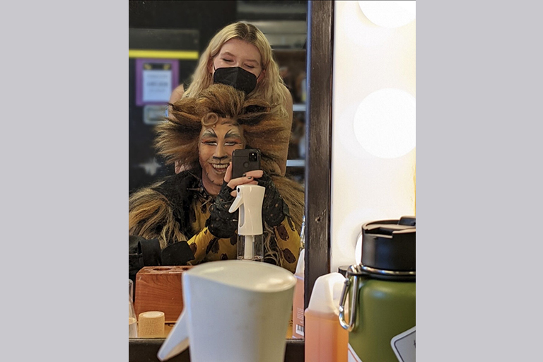 Zach Bravo as Rum Tum Tugger in Cats and Amelia Brown.
