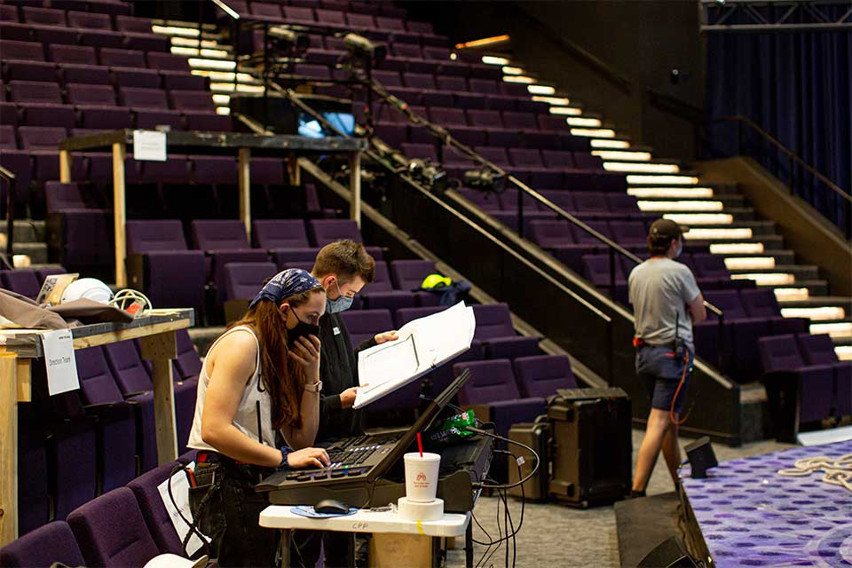 Design & Production students prepare for "Heathers: The Musical" in Freedman Theatre. / Photo: Kendall Best