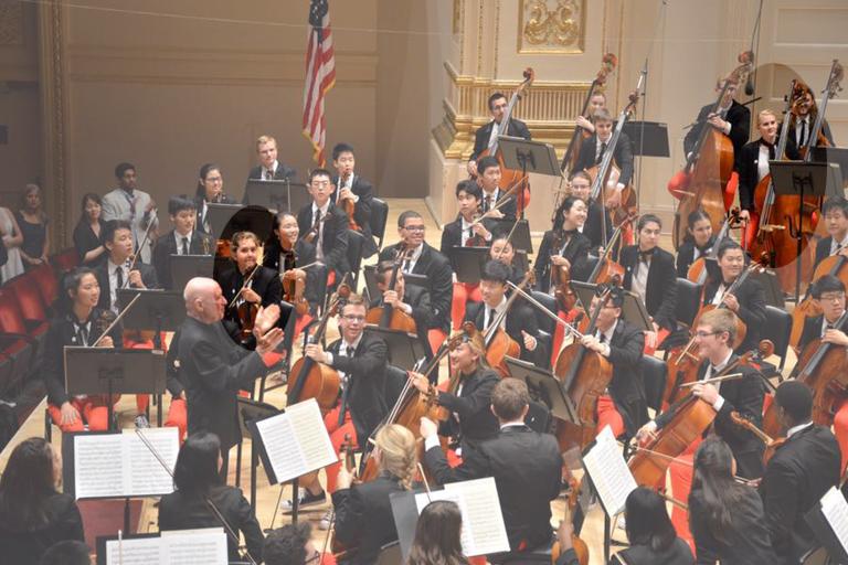 The Sharpe sisters, Emi and Ella, perform on the violin and double bass, respectively, at Carnegie Hall in New York. Photo: Marjie Sharpe