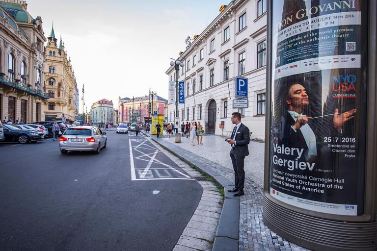 A National Youth Orchestra - USA poster advertises the concert on the city street in Prague. Photo: Chris Lee