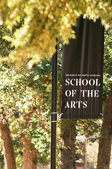 UNCSA banner in trees