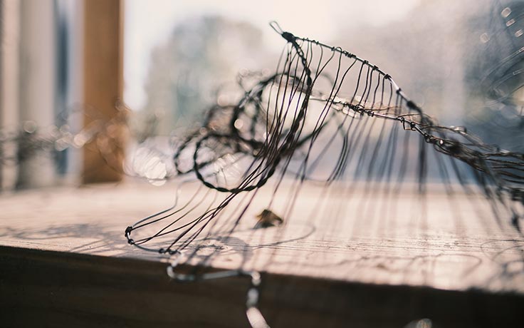 Wire sculpture in sunlight