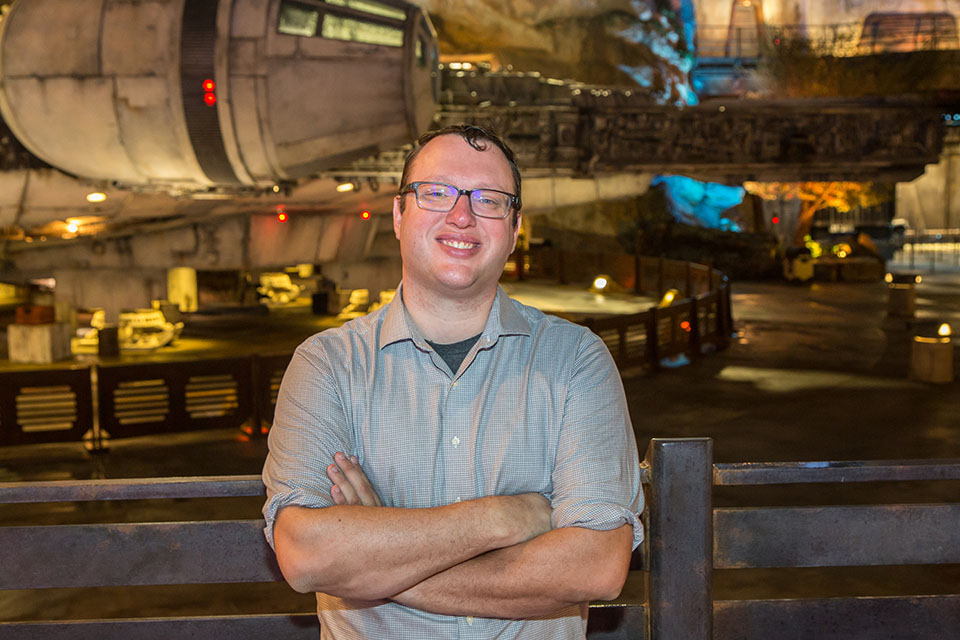 Nathaniel Gearhart in front of the Millenium Falcon at Walt Disney World
