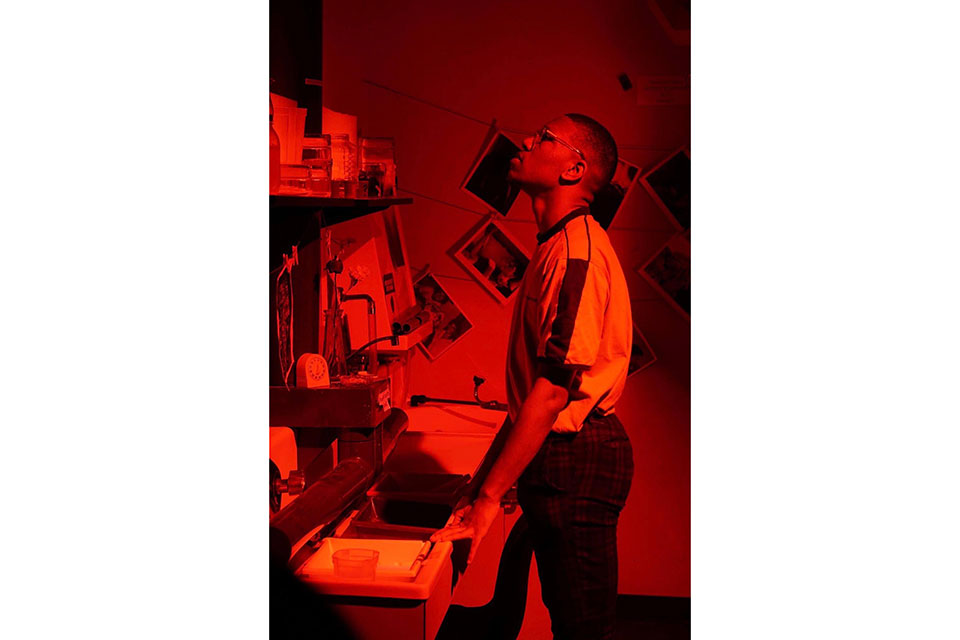 Lawrence Davis film still image, red darkroom