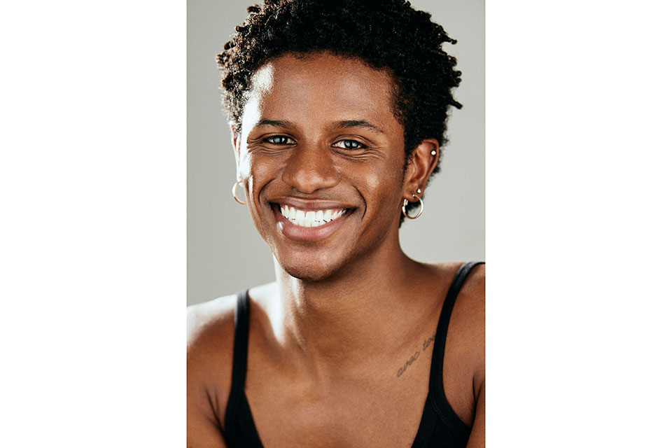 N'yomi Stewart headshot smiling