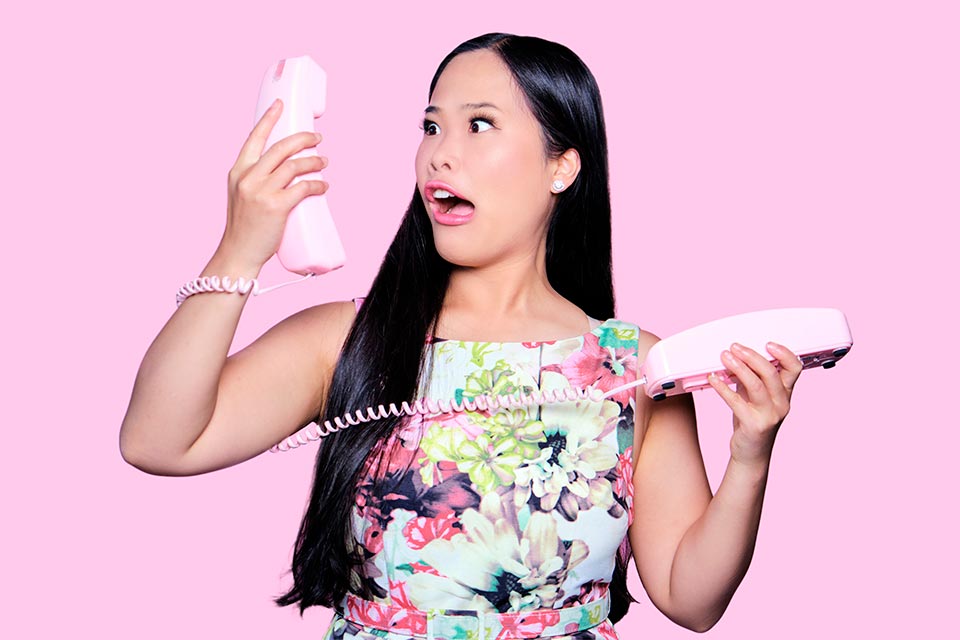 Isabelle Bushue holding pink telephone