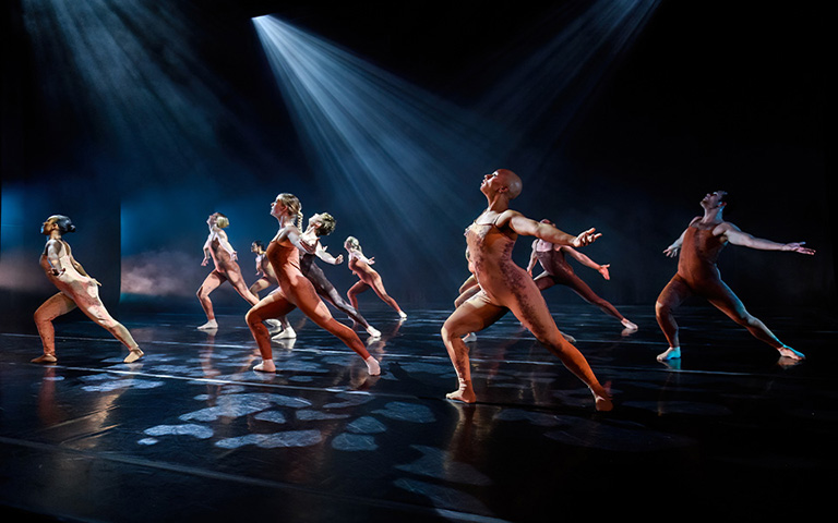 Contemporary dancers performing on stage