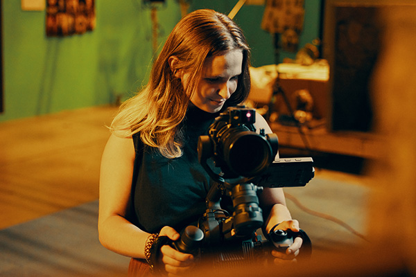 Film student holding a camera
