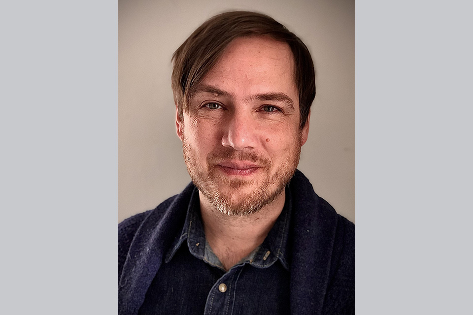 A portrait photo of Ben Masterson