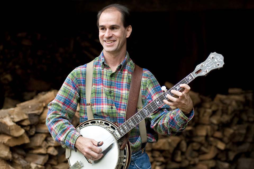 Rex McGee playing the banjo