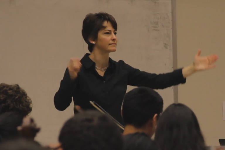 Laura Jackson conducting rehearsal in the UNCSA School of Music Complex