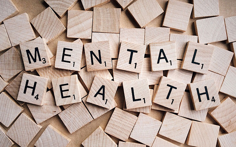 Mental Health spelled in wooden tiles