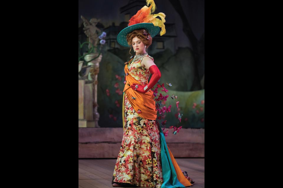 Student in costume for "The Italian Straw Hat" opera