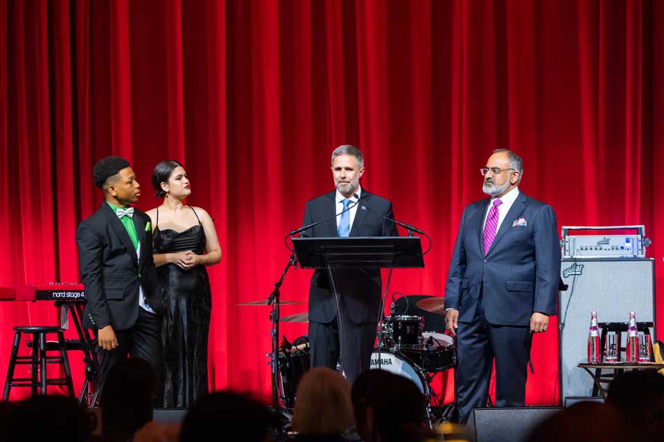Chancellor Brian Cole on stage at "An Evening of Stars," the annual Posse Foundation Gala