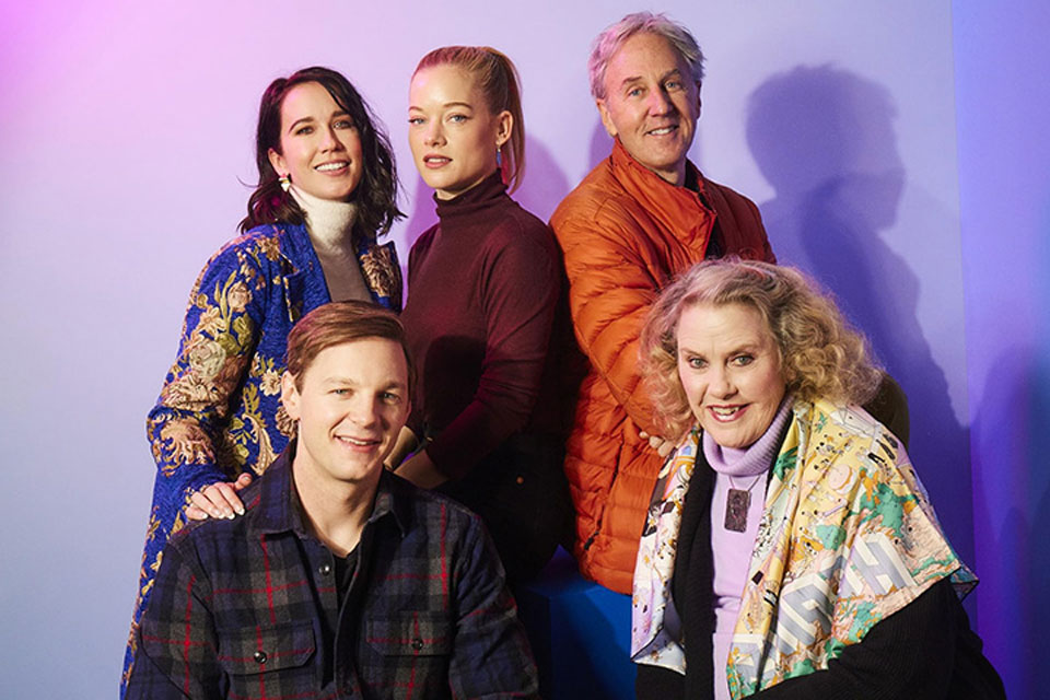 A group photo of the cast and writer and director from the film. 