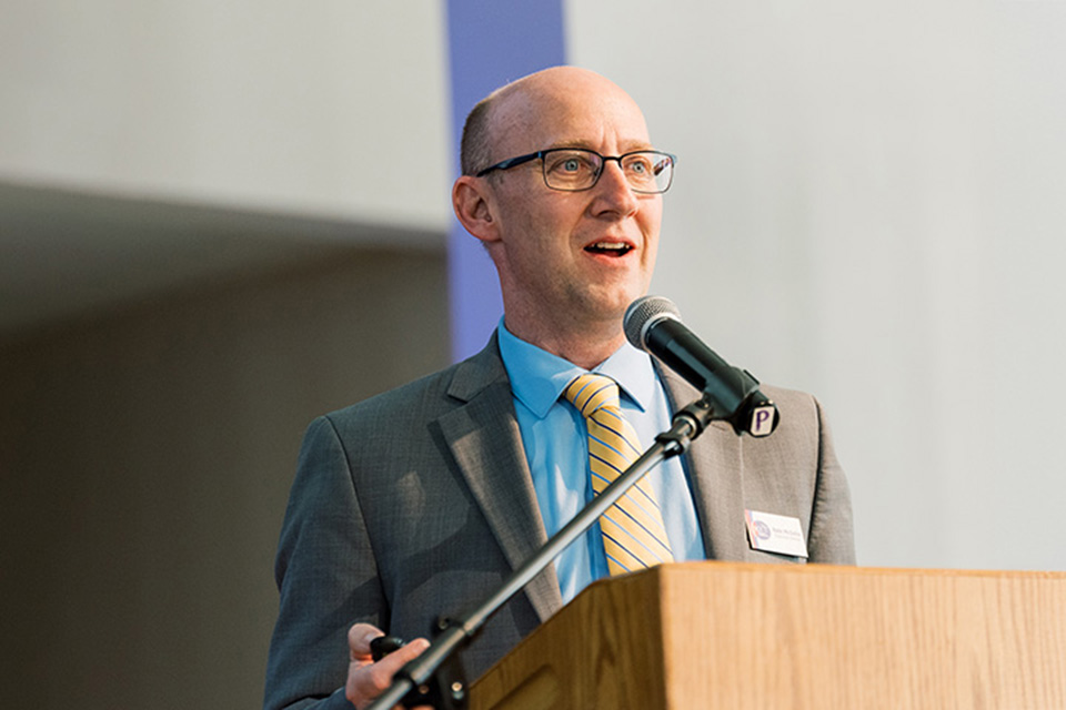 Nate McGaha speaking at an event / Photo courtesy of Nate McGaha