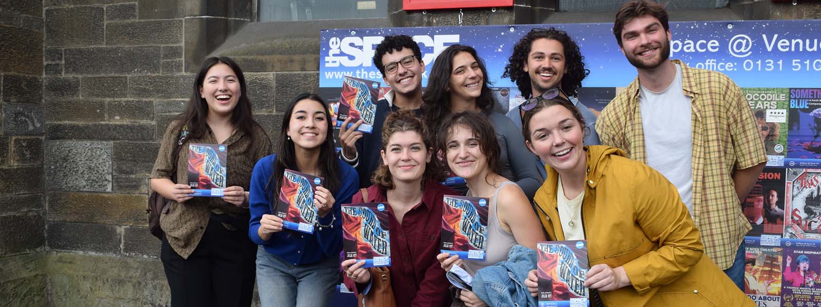 The cast and crew of “The Sound of Water” market their show at the Fringe. Front row, L-R: Jaclyn Lee, Grace Woosley, Emma Claire Kae, Yael Eve and Julia Ott. Back row, L-R: Daniel Rosales, Kassandra Rubio, Ron Weiss and Evan Barnard.
